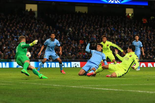 Luis Suarez of Barcelona scores his sides second goal - Manchester City vs. Barcelona - UEFA Champions League - Etihad Stadium - Manchester - 25 02 2015 Pic Philip Oldham Sportimage EDITORIAL USE ONLY. No use with unauthorised audio, video, data, fixture lists, club league logos or live services. Online in-match use limited to 120 images, no video emulation. No use in betting, games or single club league player publications.