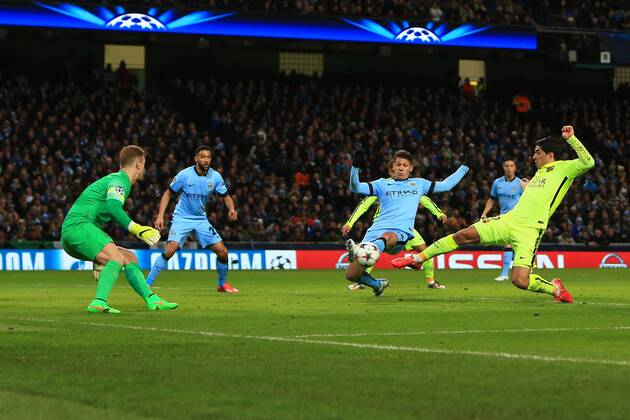 Luis Suarez of Barcelona scores his sides second goal - Manchester City vs. Barcelona - UEFA Champions League - Etihad Stadium - Manchester - 25 02 2015 Pic Philip Oldham Sportimage EDITORIAL USE ONLY. No use with unauthorised audio, video, data, fixture lists, club league logos or live services. Online in-match use limited to 120 images, no video emulation. No use in betting, games or single club league player publications.