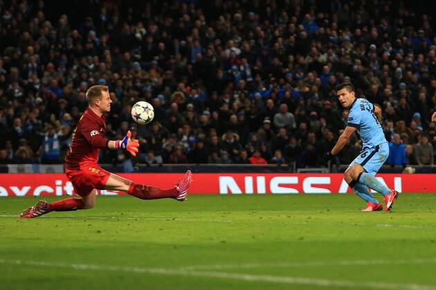 Sergio Kun Aguero of Manchester City scores his sides first goal - Manchester City vs. Barcelona - UEFA Champions League - Etihad Stadium - Manchester - EDITORIAL USE ONLY. No use with unauthorised audio, video, data, fixture lists, club league logos or live services. Online in-match use limited to 120 images, no video emulation. No use in betting, games or single club league player publications.