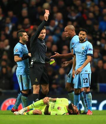 Gael Clichy of Manchester City is shown a red card - Manchester City vs. Barcelona - UEFA Champions League - Etihad Stadium - Manchester - EDITORIAL USE ONLY. No use with unauthorised audio, video, data, fixture lists, club league logos or live services. Online in-match use limited to 120 images, no video emulation. No use in betting, games or single club league player publications.