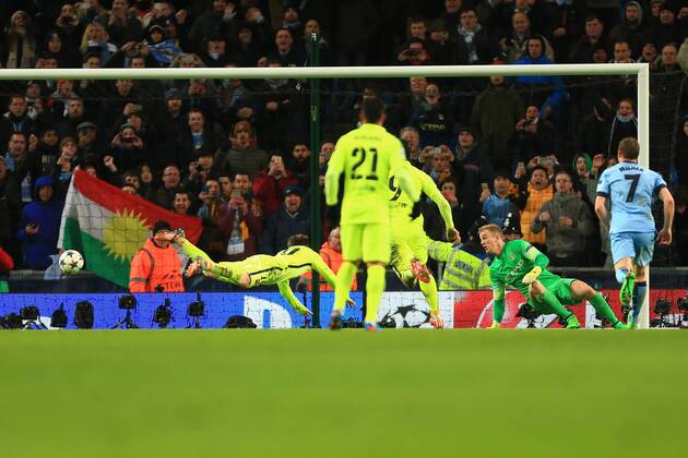 Joe Hart of Manchester City watches on as Lionel Messi of Barcelona attempts to save his saved penalty with a diving header - Manchester City vs. Barcelona - UEFA Champions League - Etihad Stadium - Manchester - EDITORIAL USE ONLY. No use with unauthorised audio, video, data, fixture lists, club league logos or live services. Online in-match use limited to 120 images, no video emulation. No use in betting, games or single club league player publications.