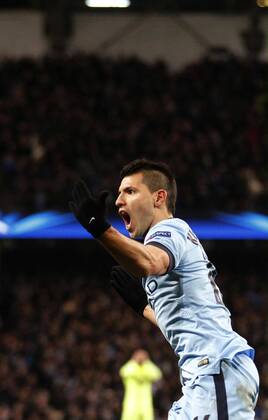 Sergio Kun Aguero of Manchester City celebrates after scoring during the UEFA Champions league Round of 16 first leg match between Manchester City and Barcelona at Etihad Stadium in Manchester, Britain, on Feb. 24, 2015. Barcelona won 2-1. ) (SP)BRITAIN-MANCHESTER-FOOTBALL-CHAMPIONS LEAGUE-ROUND OF 16 1ST LEG-MANCHESTER CITY VS BARCELONA HanxYan 