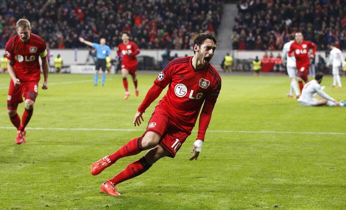 Leverkusens Hakan Calhanoglu celebrates scoring the 1:0 during the Championsleague between Bayer 04 Leverkusen and Atletico Madrid, Bayarena in Leverkusen on February 25., 2015. Bayer 04 Leverkusen vs. Atletico Madrid im Achtelfinale der Champions League der Saison 2014 2015 am 25. Februar 2015.