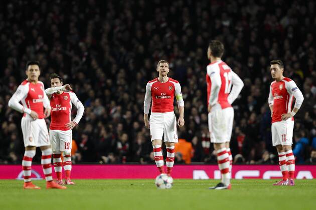25.02.2015. London, England. Champions League Football. Arsenal versus AS Monaco. Arsenal players look dejected after conceding the first goal to make it 0-1 xCraigxMercerx  ActionPlus11600418