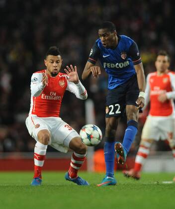 Football - 2014 2015 Champions League - Round of 16, First Leg: Arsenal vs. AS Monaco Francis Coquelin and Monaco s goalscorer Geoffrey Kondogbia of Arsenal at The Emirates. COLORSPORT ANDREW COWIE 