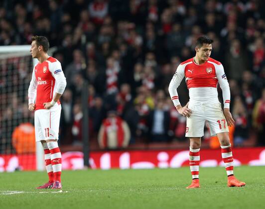 Arsenal s Alexis Sanchez looks on dejected after going 3-1 down Champions League - Arsenal vs AS Monaco - Emirates Stadium - England - 25th February 2015 - Picture David Klein Sportimage EDITORIAL USE ONLY. No use with unauthorised audio, video, data, fixture lists, club league logos or live services. Online in-match use limited to 120 images, no video emulation. No use in betting, games or single club league player publications.