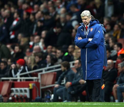Arsenal s Arsene Wenger looks on dejected Champions League - Arsenal vs AS Monaco - Emirates Stadium - England - 25th February 2015 - EDITORIAL USE ONLY. No use with unauthorised audio, video, data, fixture lists, club league logos or live services. Online in-match use limited to 120 images, no video emulation. No use in betting, games or single club league player publications.