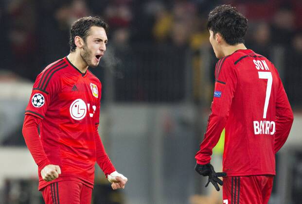 Leverkusen, 25.02.2015, BayArena Jubel: Hakan Calhanoglu (Bayer), Heung-Min Son (Bayer) Bayer Leverkusen - Atletico Madrid mm