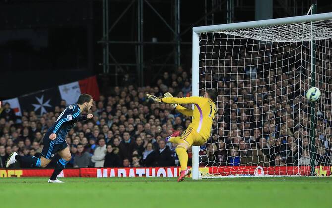 Chelsea s Eden Hazard scoring his sides opening goal Barclays Premier League - - West Ham United vs FC Chelsea United - Upton Park - England - 4th March 2015 - Picture DavidxKlein Sportimage EDITORIAL USE ONLY. No use with unauthorised audio, video, data, fixture lists, club league logos or live services. Online in-match use limited to 120 images, no video emulation. No use in betting, games or single club league player publications.