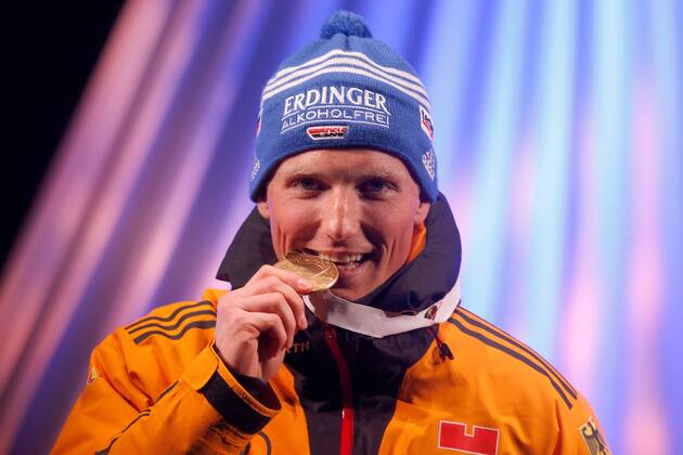 BIATHLON - IBU WC Kontiolahti 2015 KONTIOLAHTI,FINLAND,08.MAR.15 - BIATHLON - IBU World Championships, 12,5km pursuit, men, Medal Plaza, award ceremony. Image shows Erik Lesser (GER).