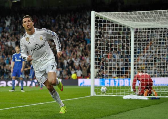 Real Madrid Forward, Cristiano Ronaldo, number 7 celebrates after scoring a goal (2,1). CHAMPIONS LEAGUE 2014 2015 Real Madrid - FC Schalke 04 . 