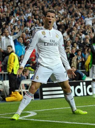 Real Madrid Forward, Cristiano Ronaldo, number 7 celebrates after scoring a goal (2,1). CHAMPIONS LEAGUE 2014 2015 Real Madrid - FC Schalke 04 . 