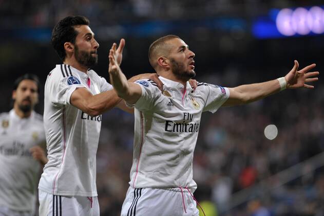 Real Madrid Forward, Karim Benzema - BENZEMA, number 9 celebrates after scoring a goal (3,2). CHAMPIONS LEAGUE 2014 2015 Real Madrid - FC Schalke 04 . 