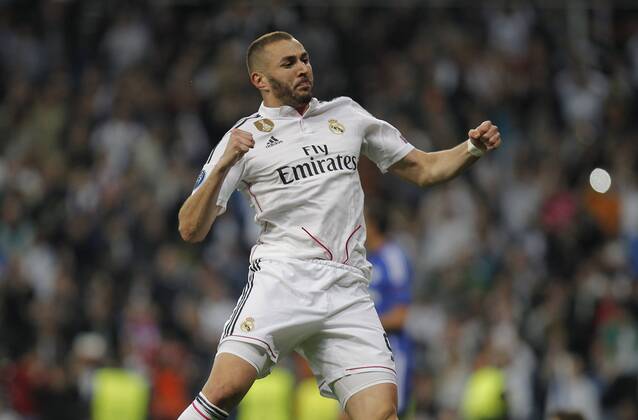 Soccer match between Real Madrid and FC Schalke 04 of the 2014 2015 Champions League, held at the Santiago Bernabeu stadium, in Madrid 10 03 2015. Karim Benzema celebrates after scoring 