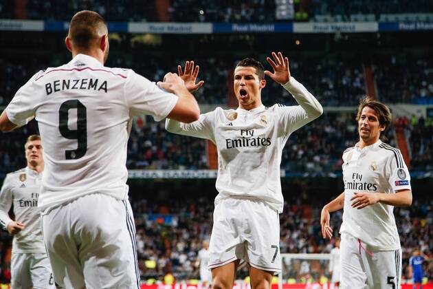 Aktuell Fußball, Champions League, Real Madrid - FC Schalke 04 Cristiano Ronaldo, Karim Benzema Real, MARCH 10, 2015 - Football Soccer Cristiano Ronaldo of Real Madrid congratulates Karim Benzema scoring a goal to make it 3-2 during the UEFA Champions League Round of 16 second leg match between Real Madrid and FC Schalke 04 at Santiago Bernabeu in Madrid, Spain. NoxThirdxPartyxSales  mdga_rms04_057