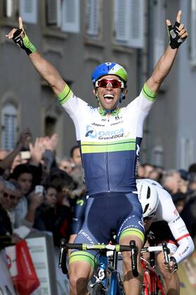 - SAINT-POURCAIN-SUR-SIOULE, FRANCE: Australian Michael Matthews of Orica GreenEDGE celebrates as he crosses the finish line to win stage 3 on the fourth day of the 73rd edition of Paris-Nice cycling race, 179 km from Saint-Amand-Montrond to Saint-Pourcain-sur-Sioule, France, Wednesday 11 March 2015. DIRKxWAEM  x04584589x