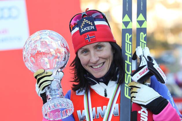 NORDIC SKIING - FIS WC Drammen DRAMMEN,NORWAY,11.MAR.15 - NORDIC SKIING, CROSS COUNTRY SKIING - FIS World Cup, sprint, ladies, award ceremony. Image shows Marit Bjoergen (NOR). Keywords: crystal globe, trophy.