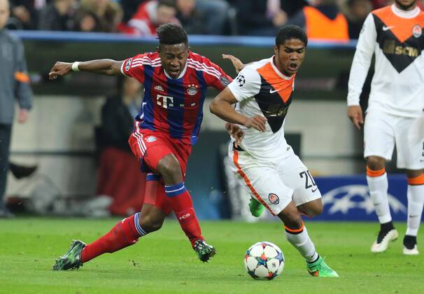 David ALABA, FCB 27 Zweikampf , Aktion um den Ball gegen Douglas COSTE, Donetsk 20 FC BAYERN MUENCHEN - FC SCHACHTAR DONEZK , Fussball UEFA Champions League, Achtelfinale Rueckspiel, Muenchen, 11.03.2015 CL Saison 2014 2015, FCB, Muenchen