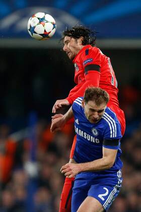 Chelsea s Branislav Ivanovic (R) in action with PSG s Maxwell - UEFA Champions League last 16 - Chelsea vs Paris Saint Germain - Stamford Bridge Stadium - London - England - 11th March 2015 - EDITORIAL USE ONLY. No use with unauthorised audio, video, data, fixture lists, club league logos or live services. Online in-match use limited to 120 images, no video emulation. No use in betting, games or single club league player publications.
