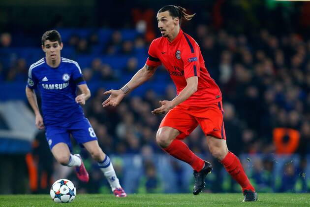 Chelsea s Oscar (L) in action with PSG s Zlatan Ibrahimovic - UEFA Champions League last 16 - Chelsea vs Paris Saint Germain - Stamford Bridge Stadium - London - England - 11th March 2015 - EDITORIAL USE ONLY. No use with unauthorised audio, video, data, fixture lists, club league logos or live services. Online in-match use limited to 120 images, no video emulation. No use in betting, games or single club league player publications.