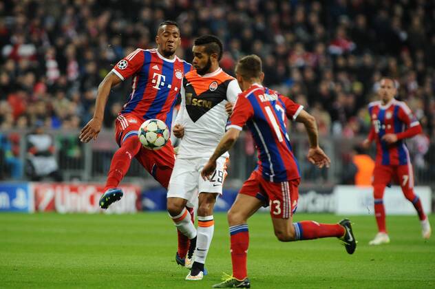 vl. Jerome Boateng (FC Bayern Muenchen), Alex Teixeira (Shakhtar Donetsk) und Rafinha (FC Bayern Muenchen) FC Bayern Muenchen - Schachtar Donezk, Fussball, Champions League, Achtelfinale, Rueckspiel, 11.03.2015, EP_WSE