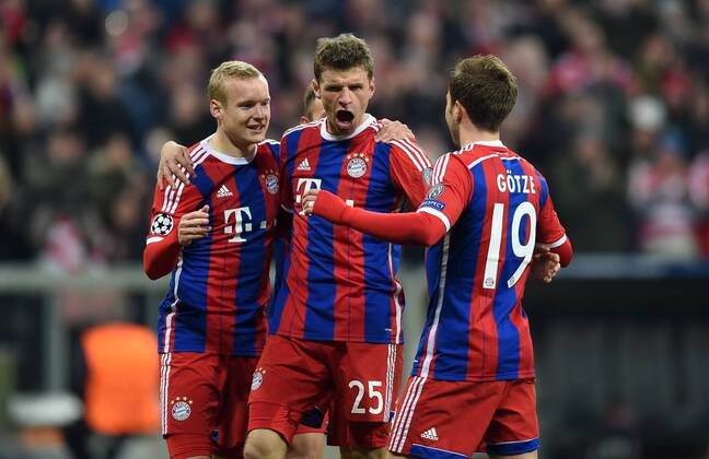 FUSSBALL CHAMPIONS LEAGUE SAISON 2014 2015 ACHTELFINAL RUECKSPIEL FC Bayern Muenchen - FC Schachtar Donezk 11.03.2015 Torjubel; Sebastian Rode, Thomas Mueller und Mario Goetze (v.l., alle FC Bayern Muenchen) 
