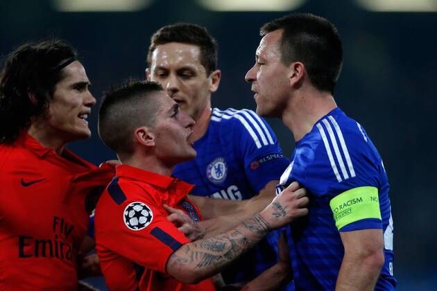 Chelsea s John Terry (R) has words with PSG s Edinson Cavani (L) - UEFA Champions League last 16 - Chelsea vs Paris Saint Germain - Stamford Bridge Stadium - London - England - 11th March 2015 - Picture Paul Thomas Sportimage EDITORIAL USE ONLY. No use with unauthorised audio, video, data, fixture lists, club league logos or live services. Online in-match use limited to 120 images, no video emulation. No use in betting, games or single club league player publications.