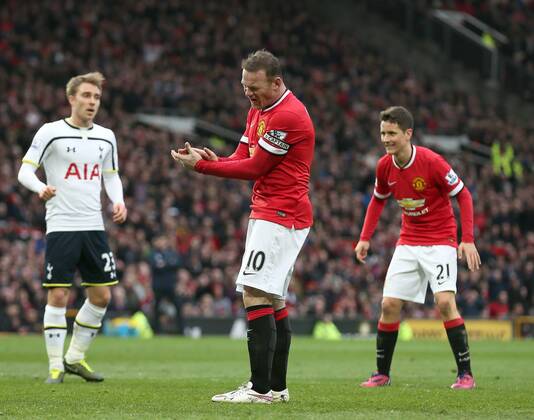 Wayne Rooney of Manchester United ManU reacts after missing a chance to score - Barclays Premier League - Manchester Utd vs Tottenham Hotspur - Old Trafford Stadium - Manchester - England - 15th March 2015 - Picture SimonBellis Sportimage EDITORIAL USE ONLY. No use with unauthorised audio, video, data, fixture lists, club league logos or live services. Online in-match use limited to 120 images, no video emulation. No use in betting, games or single club league player publications.