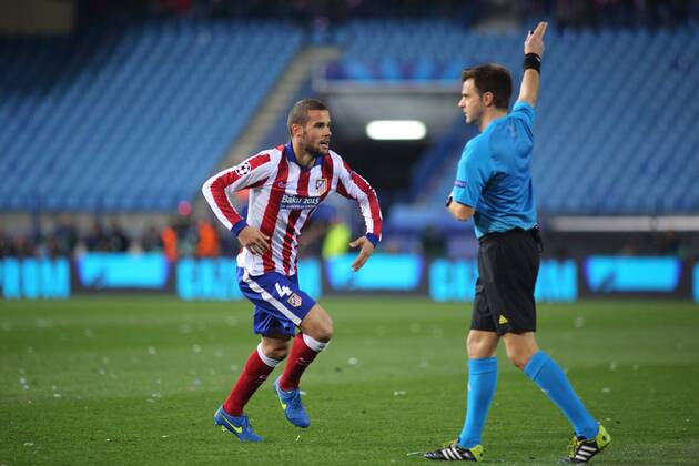 Madrid, Spain. 17th March 2015: Mario Suarez midfielder from Atletico de Madrid, celebrating after scoring during the UEFA Champions League round of 16 second leg agains Bayer 04 Leverkusen at the Vicente Calderon stadium.. 