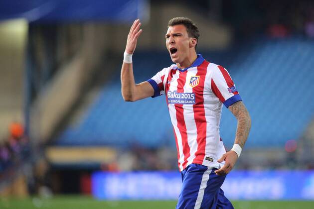 Madrid, Spain. 17th March 2015: Mario Mandzukic, forward from Atletico de Madrid, in action during the UEFA Champions League round of 16 second leg agains Bayer 04 Leverkusen at the Vicente Calderon stadium.. 