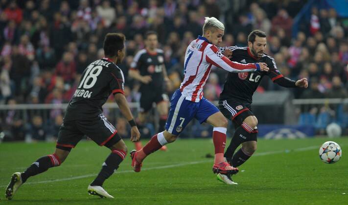 Bayer 04 Leverkusen Defender, Wendell, number 18 . Atletico de Madrid Forward, Antoine Griezmann, number 7. Round 1 8 of the CHAMPIONS league, soccer match between Atletico de Madrid - Bayer 04 Leverkusen at the Vicente Calderon estadium, Madrid - Spain by March 17, 2015. 