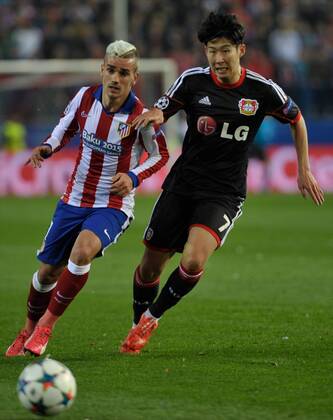 Atletico de Madrid Forward, Antoine Griezmann, number 7 . Bayer 04 Leverkusen Forward, Son Heung-Min, number 7. Round 1 8 of the CHAMPIONS league, soccer match between Atletico de Madrid - Bayer 04 Leverkusen at the Vicente Calderon estadium, Madrid - Spain by March 17, 2015. 