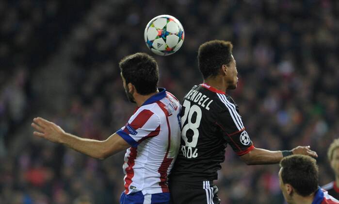 Atletico de Madrid Midfielder, Raul Garcia Escudero, number 8 . Bayer 04 Leverkusen Defender, Wendell, number 18. Round 1 8 of the CHAMPIONS league, soccer match between Atletico de Madrid - Bayer 04 Leverkusen at the Vicente Calderon estadium, Madrid - Spain by March 17, 2015. 