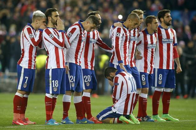 Atletico de Madrid s Antoine Griezmann, Jesus Gamez, Jose Maria Gimenez, Juanfran Torres, Arda Turan, Joao Miranda, Fernando Torres, Koke Resurrecccion and Raul Garcia during Champions League 2014 2015 match.March 17,2015.  (20150301712)