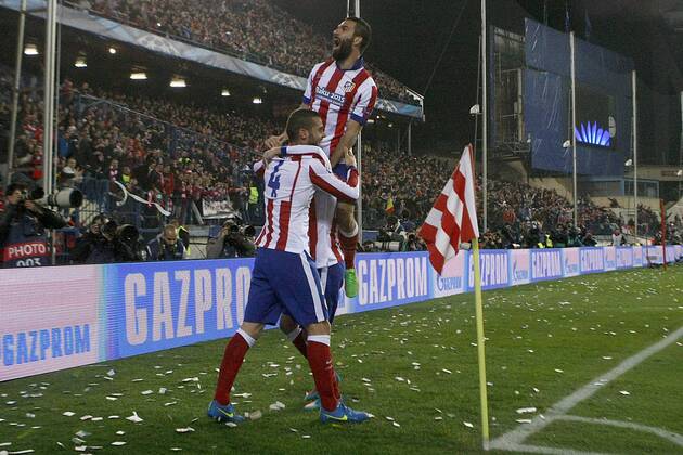 Atletico de Madrid s Mario Suarez (l) and Arda Turan celebrate goal during Champions League 2014 2015 match.March 17,2015.  (20150301774)