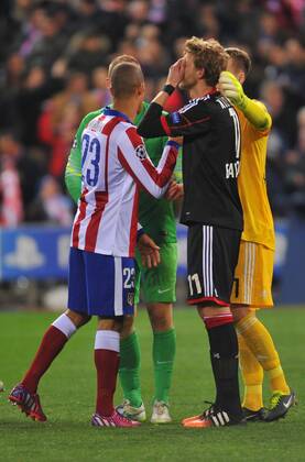 17.03.2015, xcox, Fussball UEFA Champions League, Atletico Madrid - Bayer 04 Leverkusen, v.l.Atletico players console Stefan Kiessling (Bayer 04 Leverkusen)