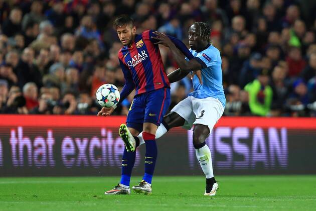 Bacary Sagna of Manchester City challenges Neymar of Barcelona - Barcelona vs. Manchester City - UEFA Champion s League - Round of 16, second leg - Nou Camp - Barcelona - 18 03 2015 Pic Philip Oldham Sportimage EDITORIAL USE ONLY. No use with unauthorised audio, video, data, fixture lists, club league logos or live services. Online in-match use limited to 120 images, no video emulation. No use in betting, games or single club league player publications.