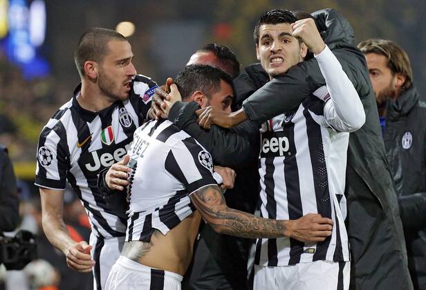 18.03.2015, xovx, Fussball UEFA Champions League, Borussia Dortmund - Juventus Turin, v.l. Jubel bei Leonardo Bonucci (Juventus Turin), Carlos Tevez (Juventus Turin) und Alvaro Morata (Juventus Turin) nach dem Tor zum 0:1, Freisteller,