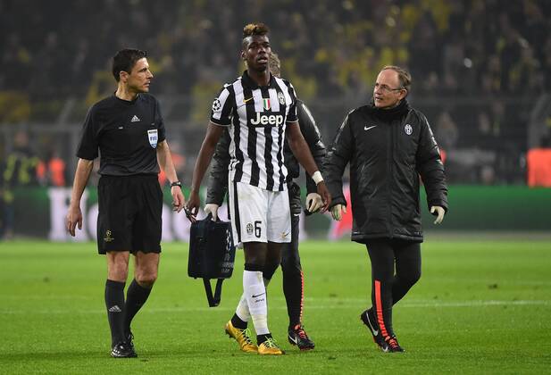 18.03.2015, xjhx, Fussball UEFA Champions League, Borussia Dortmund - Juventus Turin, v.l. Paul Pogba (Juventus Turin) verletzt, Verletzung,