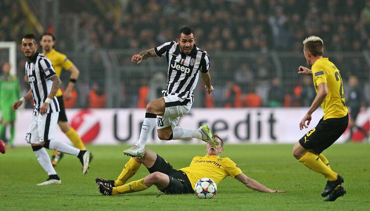 18.03.2015, Fussball Championsleague 2014 2015, Achtelfinale , Borussia Dortmund - Juventus Turin, im Signal-Iduna-Park-Stadion Dortmund. v.l. Carlos Tevez (Juventus Turin) gegen Sven Bender (Dortmund) 