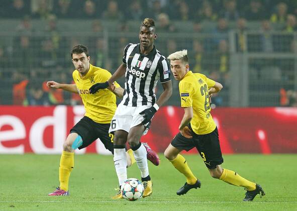 18.03.2015, Fussball Championsleague 2014 2015, Achtelfinale , Borussia Dortmund - Juventus Turin, im Signal-Iduna-Park-Stadion Dortmund. v.l. Sokratis (Dortmund) gegen Paul Pogba (Juventus Turin) und Kevin Kampl (Dortmund) 