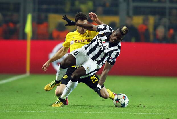Sokratis Papastathopoulos, Paul Pogba Zweikampf Aktion Spielszene BvB Borussia Dortmund - Juventus Turin Championsleague Achtelfinale 18.03.2015 Fußball Fussball Signal Iduna Park Dortmund Herren Saison 2014 2015