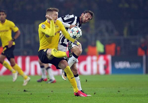 18.03.2015, xovx, Fussball UEFA Champions League, Borussia Dortmund - Juventus Turin, v.l. Zweikampf zwischen Marco Reus (Borussia Dortmund) und Claudio Marchisio (Juventus Turin), Aktion.