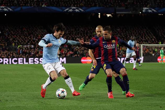 18.03.2015. Nou Camp, Barcelona, Spain. Champions League Football. FC Barcelona (Barca) versus Manchester City. David Silva in action as he cust back inside of Jordi Alba xAngelxBoludax  ActionPlus11605991