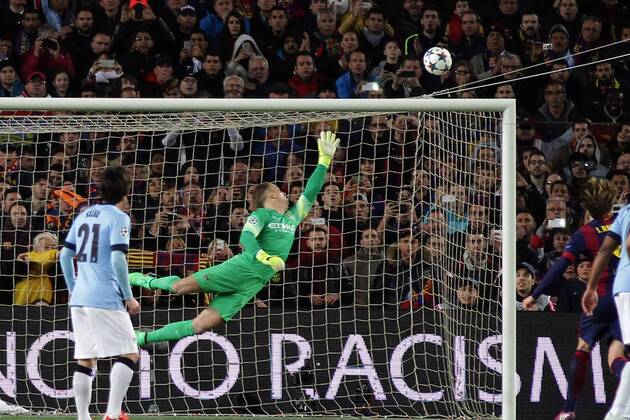 18.03.2015. Nou Camp, Barcelona, Spain. Champions League Football. FC Barcelona (Barca) versus Manchester City. Joe Hart tips shot over the bar during the match xAngelxBoludax  ActionPlus11605996