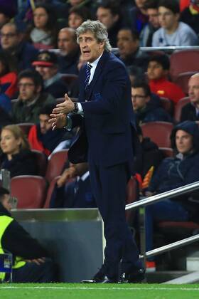Manuel Pellegrini, manager of Manchester City - Barcelona vs. Manchester City - UEFA Champion s League - Round of 16, second leg - Nou Camp - Barcelona - 18 03 2015 Pic Philip Oldham Sportimage EDITORIAL USE ONLY. No use with unauthorised audio, video, data, fixture lists, club league logos or live services. Online in-match use limited to 120 images, no video emulation. No use in betting, games or single club league player publications.