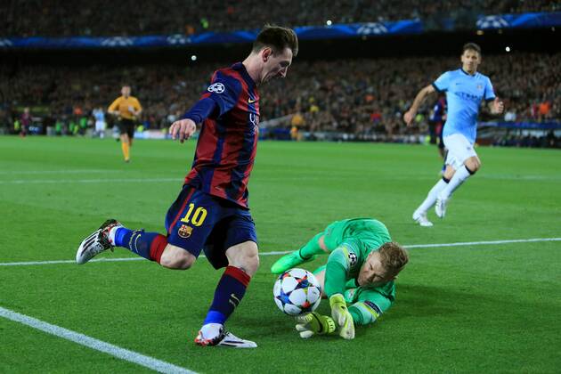 Joe Hart of Manchester City dives at the feet of Lionel Messi of Barcelona - Barcelona vs. Manchester City - UEFA Champion s League - Round of 16, second leg - Nou Camp - Barcelona - 18 03 2015 Pic Philip Oldham Sportimage EDITORIAL USE ONLY. No use with unauthorised audio, video, data, fixture lists, club league logos or live services. Online in-match use limited to 120 images, no video emulation. No use in betting, games or single club league player publications.
