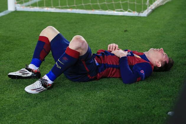 Lionel Messi of Barcelona lies down dejected - Barcelona vs. Manchester City - UEFA Champion s League - Round of 16, second leg - Nou Camp - Barcelona - 18 03 2015 Pic Philip Oldham Sportimage EDITORIAL USE ONLY. No use with unauthorised audio, video, data, fixture lists, club league logos or live services. Online in-match use limited to 120 images, no video emulation. No use in betting, games or single club league player publications.