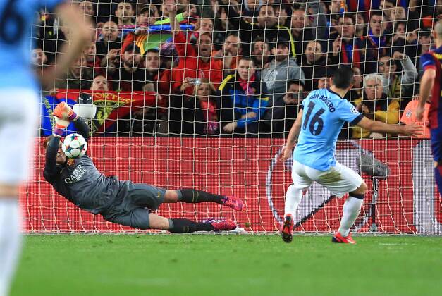Marc-Andre ter Stegen of Barcelona saves a penalty kick from Sergio Kun Agüero of Manchester City - Barcelona vs. Manchester City - UEFA Champion s League - Round of 16, second leg - Nou Camp - Barcelona - 18 03 2015 Pic Philip Oldham Sportimage EDITORIAL USE ONLY. No use with unauthorised audio, video, data, fixture lists, club league logos or live services. Online in-match use limited to 120 images, no video emulation. No use in betting, games or single club league player publications.