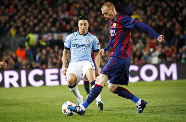 March 18, 2015 - Barcelona, Catalonia, spain - BARCELONA, SPAIN - MARCH 18: Samir Nasri and Jeremy Mathieu during the UEFA Champions League round of 16 match between FC Barcelona Barca and Manchester City at Camp Nou Stadium on March 18, 2015 in Barcelona, Spain. (Photo by Joan Valls UrbanandSport NurPhoto) Barcelona and Manchester City  - ZUMAn230